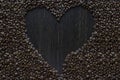 Heart coffee frame made of coffee beans on wooden dark background. copy space Royalty Free Stock Photo