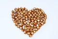 Heart consists of hazelnuts isolated