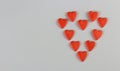 Heart consists of little red hearts on a blue background