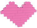 Heart construction made of pink toy bricks