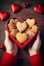 Heart cookies in hands. Selective focus.