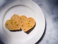Heart Cookies on white plate Love Valentine`s sweet