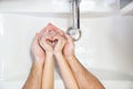 Heart. dad teaches daughter thorough washing hands Royalty Free Stock Photo