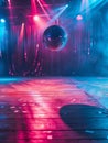 The heart of a dance floor comes alive with a shimmering disco ball under vibrant pink and blue lights. The reflective