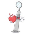 With heart dental mirror isolated in the character Royalty Free Stock Photo