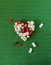 Heart of dices on green cloth love of gambling Royalty Free Stock Photo
