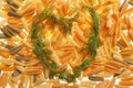 Heart from dill on the spaghetti Royalty Free Stock Photo