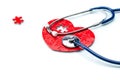 Heart disease, puzzle heart with stethoscope Royalty Free Stock Photo