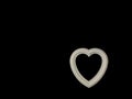 Heart with a door handle on a black background. The white heart opens with a hand. Concept: closed heart Royalty Free Stock Photo