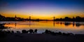 Sundown over the riverside of the river Rhein in Cologne at the Sandy beach shore Royalty Free Stock Photo