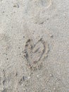 Heart drawing in beach sandHeart drawing in beach sand Royalty Free Stock Photo