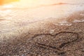 Heart Drawing In The Sand Beach. Romantic Composition. Heart On Beach