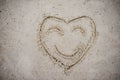Heart, drawn on the beach sand. heart symbol on the sand washed Royalty Free Stock Photo