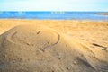 Heart drawn on the beach during sunset Royalty Free Stock Photo