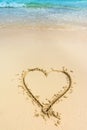 Heart drawn on caribbean white sand Royalty Free Stock Photo