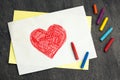 heart drawn with crayons on a white sheet of paper, children\'s drawing, happy mother\'s day, father\'s day Royalty Free Stock Photo