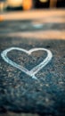 Heart is drawn on the ground with chalk Royalty Free Stock Photo