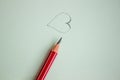 Heart drawn in pencil on a paper sheet, Close-up Royalty Free Stock Photo