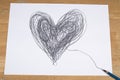 Heart drawn by pencil on paper sheet Royalty Free Stock Photo