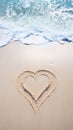 A heart drawn in the sand on a beach Royalty Free Stock Photo