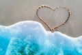 Heart drawn on a sand of beach Royalty Free Stock Photo