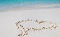 Heart drawn on white sand Royalty Free Stock Photo