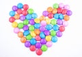 Heart filled with gems or colour chocolate candies