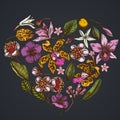 Heart floral design on dark background with laelia, feijoa flowers, glory bush, papilio torquatus, cinchona, cattleya