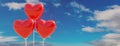 Heart flying balloon shiny red color on blue cloudy sky background. Copy space, banner. 3d rendering Royalty Free Stock Photo