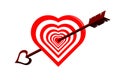 Heart in the form of a target pierced by a cupids arrow Royalty Free Stock Photo