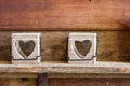 Heart frame ceramic on wood wall Royalty Free Stock Photo