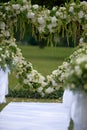 Heart frame made of beautiful flowers. Arch made for wedding ceremony Royalty Free Stock Photo