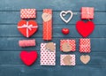 Heart and gift boxes over wooden background. Flat lay Royalty Free Stock Photo