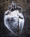 Heart graffiti over a door and wall in Palermo