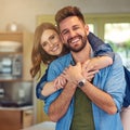 The heart of a great marriage is love. Portrait of a happy young couple embracing at home. Royalty Free Stock Photo