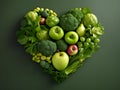 Heart of green fruits and vegetables isolated on green background. Green life concept and healthy eating lifestyle. Shape of heart Royalty Free Stock Photo