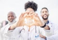 Heart hand, happy and portrait of doctors in the city for healthcare, medical attention and care. Smile, medicine and Royalty Free Stock Photo
