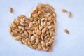 Gold Flaxseeds in a Heart Shape