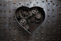 Heart hole in old metal with gears and cogs Royalty Free Stock Photo