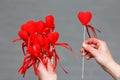 A Heart in human hands on white brick background Royalty Free Stock Photo