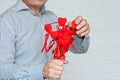 A Heart in human hands on white brick background Royalty Free Stock Photo