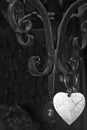 Heart key chain on the fence Royalty Free Stock Photo