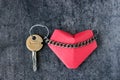 Heart and a key, connected by a chain. Royalty Free Stock Photo