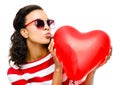 Heart, kiss and valentines day with a black woman in studio isolated on a white background for love or romance. Red Royalty Free Stock Photo