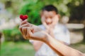 Heart knit in the hands of the girl. Royalty Free Stock Photo