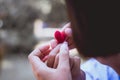 Heart knit in the hands of the girl. Royalty Free Stock Photo