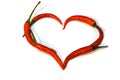 Heart laid out of red chili peppers