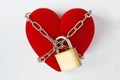 Heart locked with chain and padlock on white background - Concept of love Royalty Free Stock Photo