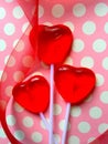 Heart lollipops on polka dots