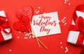 Heart lollipops: Sweet treats on a red backdrop with text space